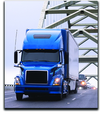 Blue big rig semi truck transporting semi trailer on arched Fremont bridge